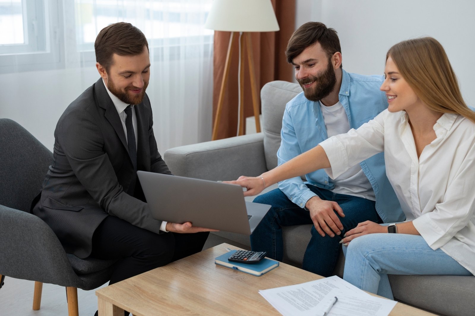 Broker assists people in applying for home loans.